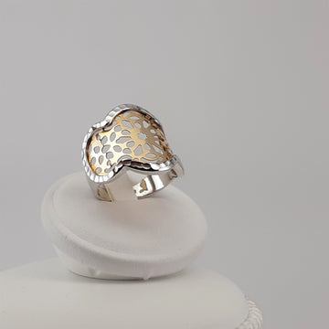 ANELLO A FASCIA IN ORO BIANCO E GIALLO TRAFORATO