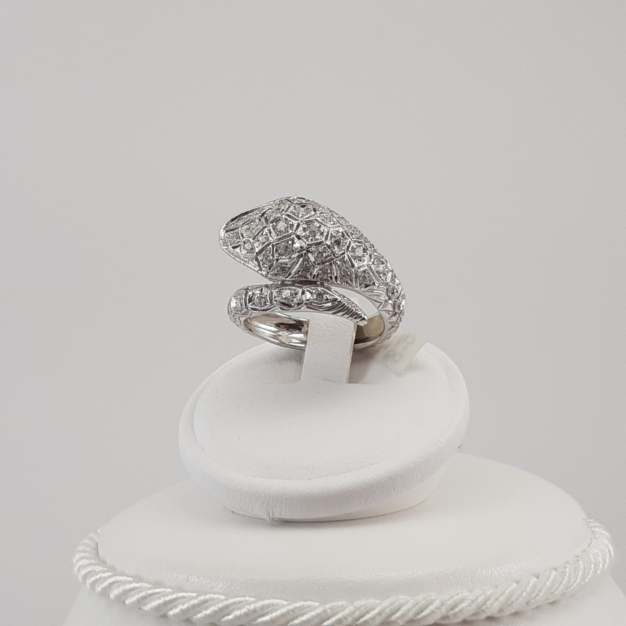ANELLO SERPENTE IN ORO BIANCO CON ZIRCONI