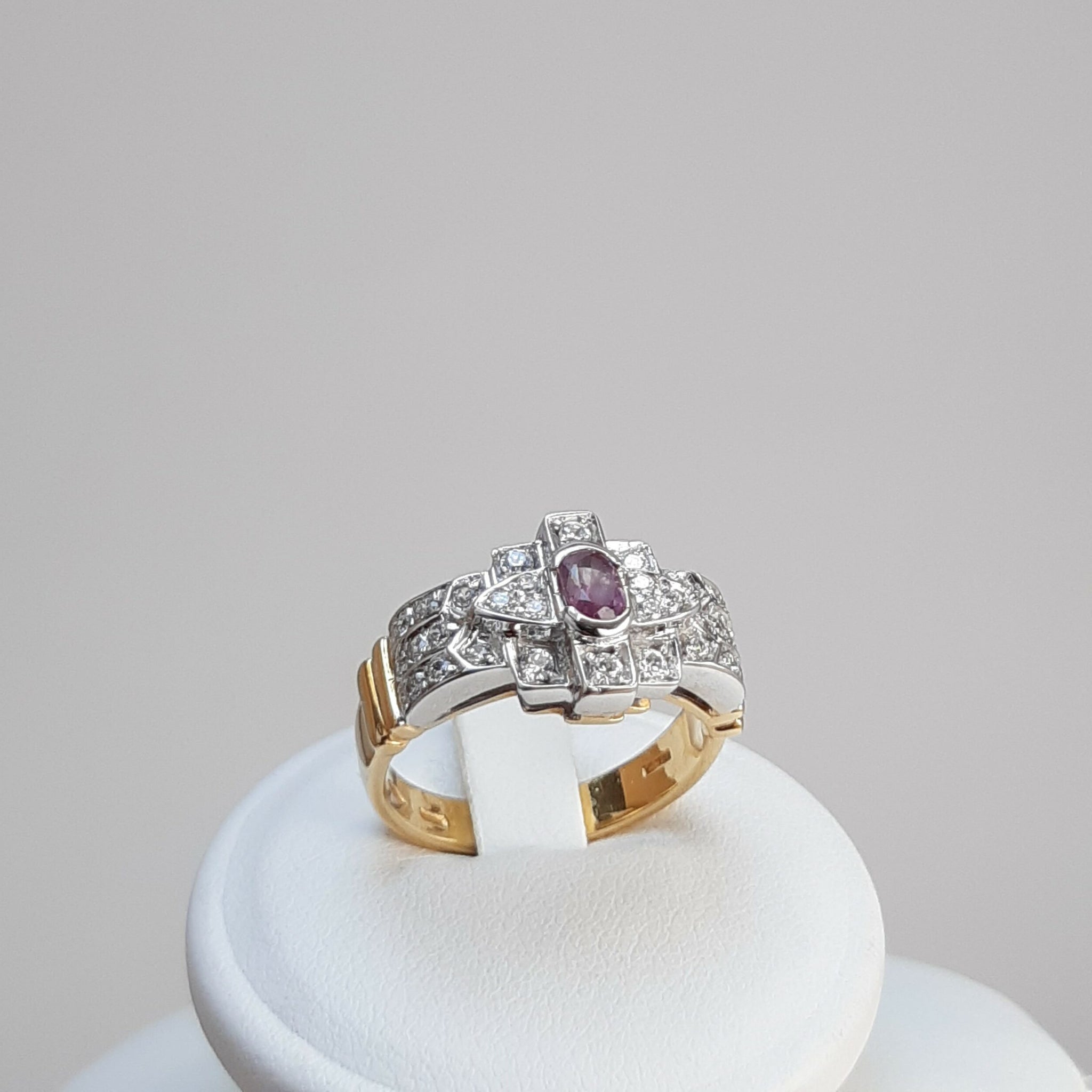 ANELLO IN ORO CON TORMALINA E ZIRCONI