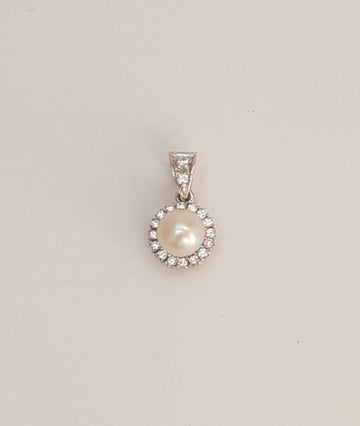 CIONDOLO IN ORO BIANCO CON PERLA